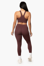 Load image into Gallery viewer, Burgundy leggings with pockets. DH logo on left side.
