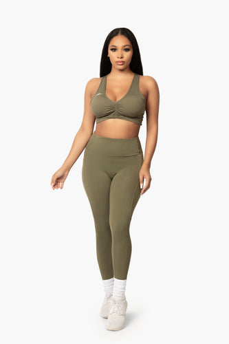 Olive Green leggings with pockets. DH logo on left side.